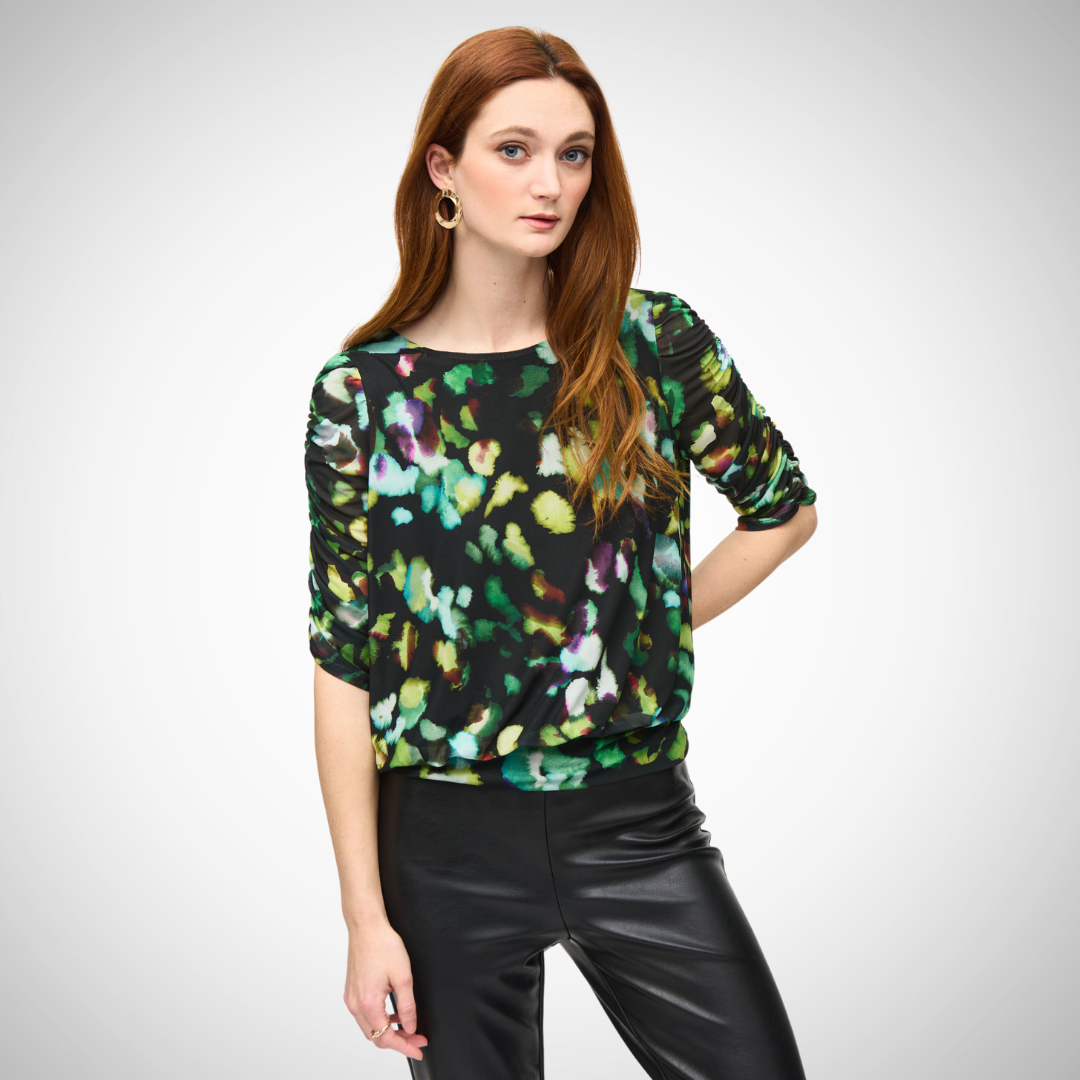 Joseph Ribkoff Green/Black Blouse  green print on black, Ruching on 3/4 sleeves for elegance, Boat neck design,  a short-length frame, Bohemian vibe Made of 95% polyester and 5% spandex. Trendy stylish, and comfortable.