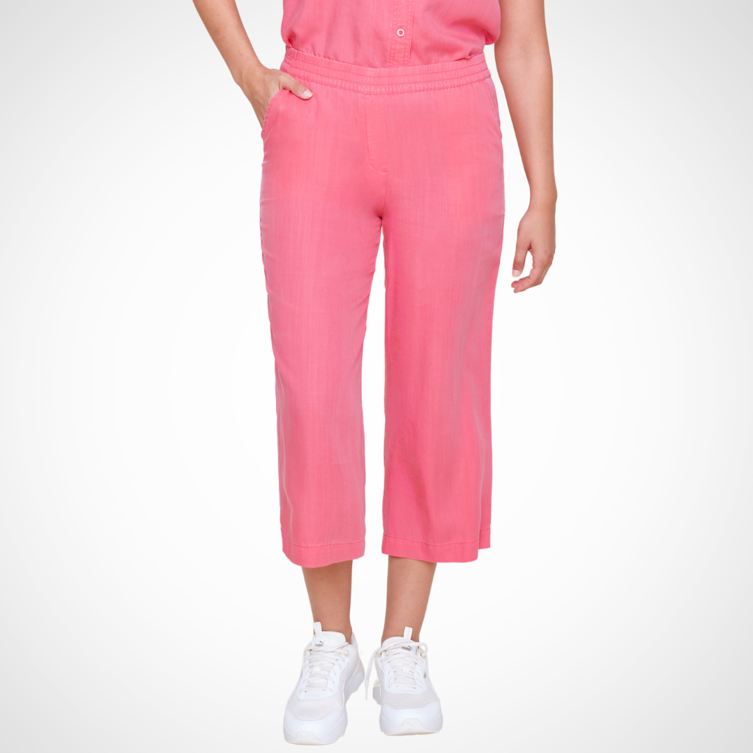 Jaboli Boutique - Fergus Ontario - Renuar - Pull On Gaucho - Magnolia (watermelon pink) ChatGPT Renuar Pull On Gaucho cropped pant: Ideal for travel. Features pull-on style and wide-leg Gaucho silhouette. Available in Magnolia and Chambray colors. Relaxed fit with a 23-inch inseam. Includes pockets for convenience. Made from lightweight and comfortable Tencel fabric.