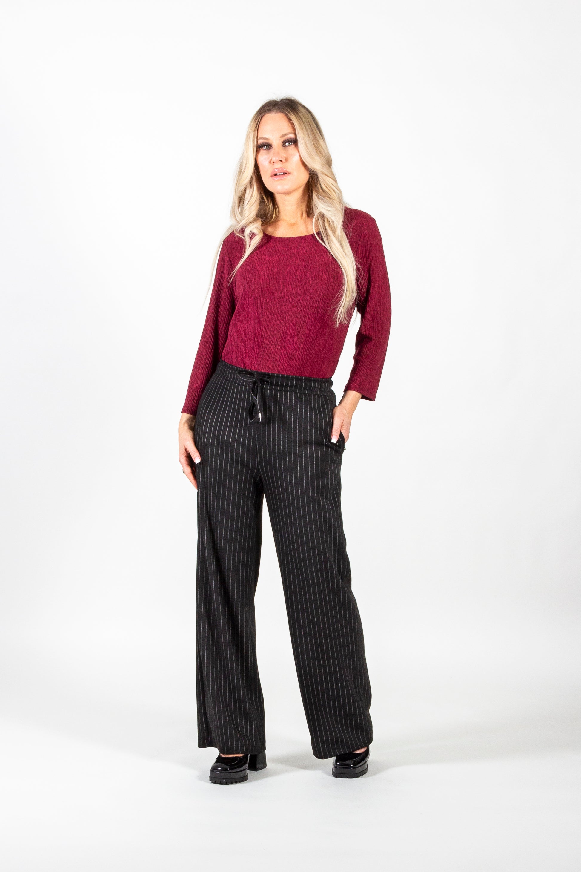 Pure Essence Black/Cream Dress Pant -579-2374 PANTBlack dress pants with cream pinstripes, featuring an adjustable pull-on waist, wide-leg silhouette, and a 30" inseam. Comfortable, elegant, and perfect for work, formal events, evenings out, or travel.